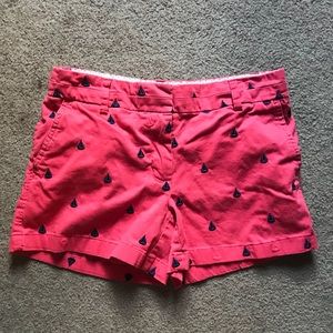 Pink shorts with navy sail boats